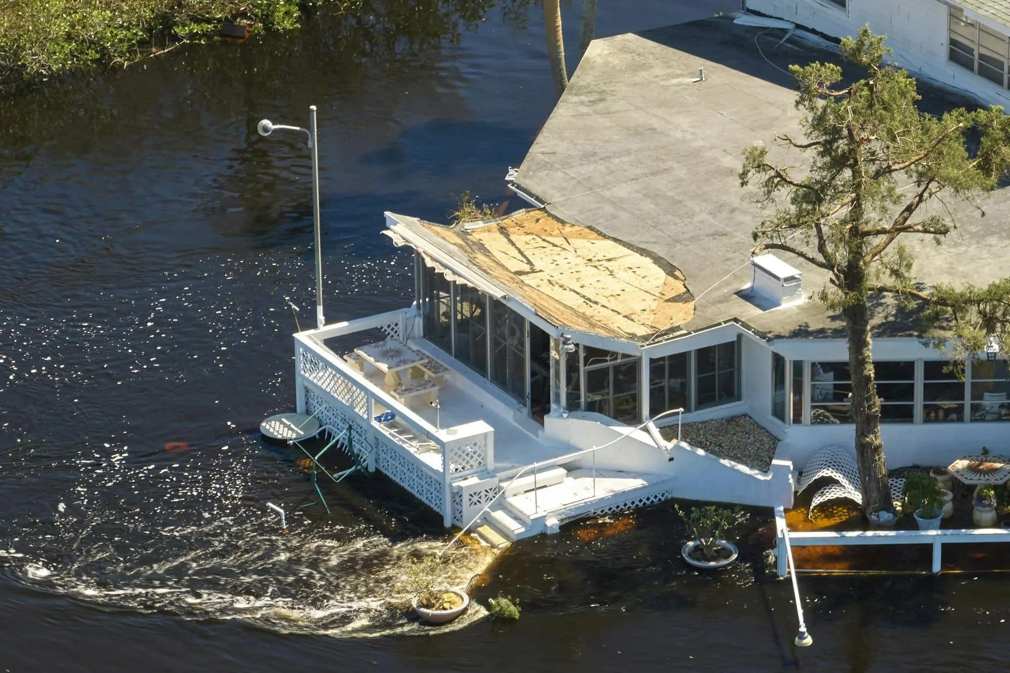 Property with combined flood and hurricane damage sold for cash